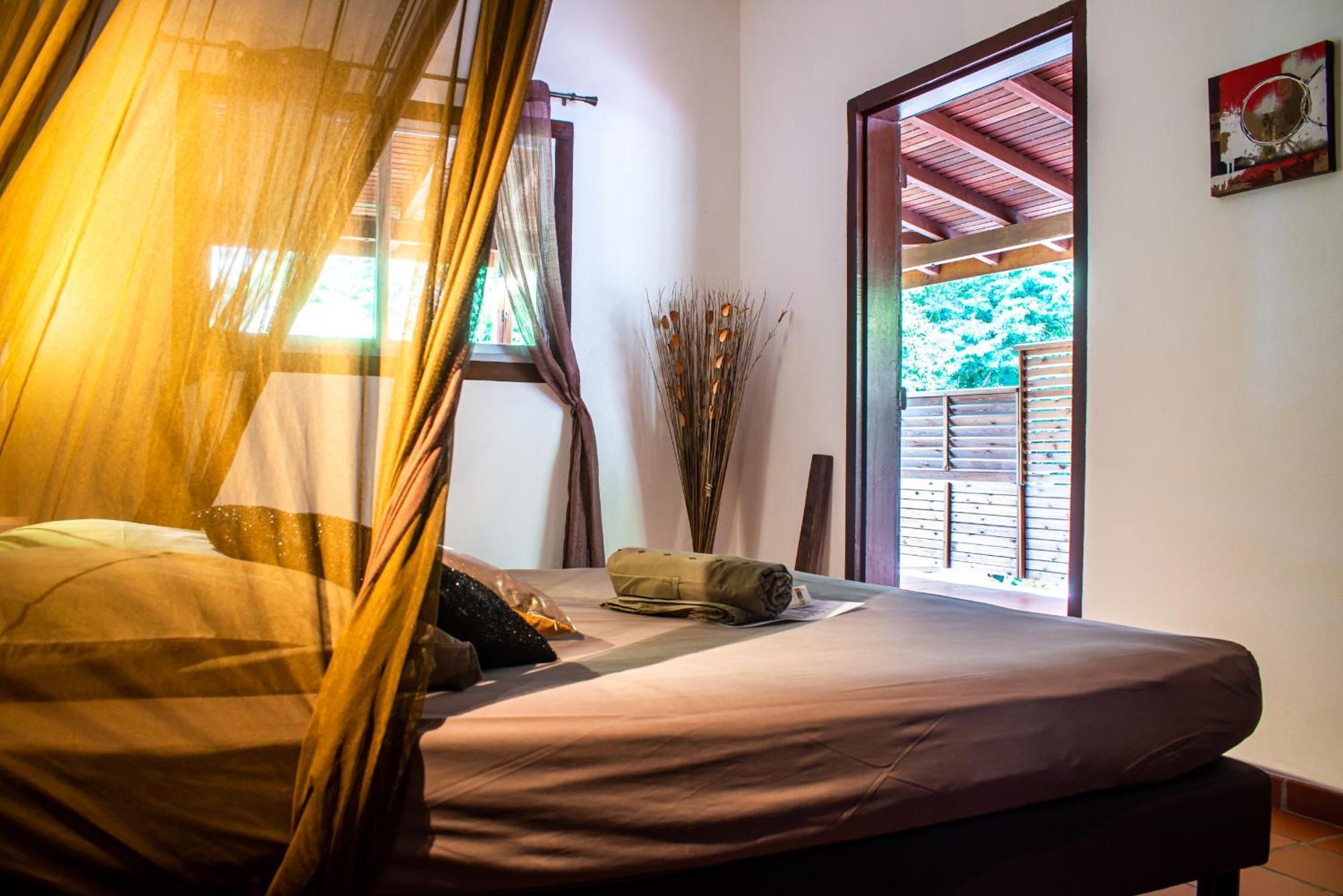 Au Jardin Des Colibris Ecolodge&Spa Deshaies Buitenkant foto